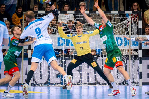 Stuttgart, Germany 08 March 2020 HBL 19 20 TVB 1898 Stuttgart vs SC Magdeburg Manuel Spaeth Stuttgart on the throw, goalkeeper Tobias Thulin Magdeburg , Albin Lagergren Magdeburg Stuttgart Scharrena Baden Württemberg Germany