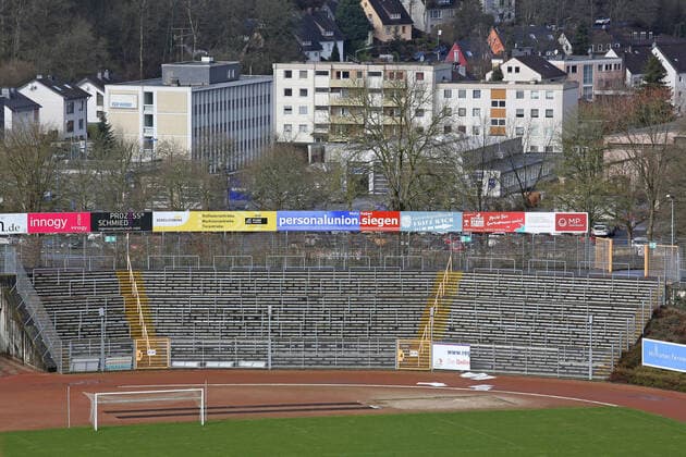 Fear of coronavirus, there are also ghost games in the Bundesliga Symbol image, empty spectator stands in the Leimbach Stadium in Siegen, home of the Sportfreunde Siegen Symbol image on the topic of coronavirus, ghost games on 09 03 2020 in Siegen Germany