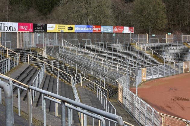 Fear of coronavirus, there are also ghost games in the Bundesliga Symbol image, empty spectator stands in the Leimbach Stadium in Siegen, home of the Sportfreunde Siegen Symbol image on the topic of coronavirus, ghost games on 09 03 2020 in Siegen Germany
