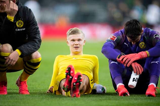 Erling HAALAND DO lies after the play on the lawn and hears the fans to football 1 federal league, 25 play day, Borussia Moenchengladbach MG Borussia Dortmund DO 1 2, to 07 03 2020 in Moenchengladbach Germany Â