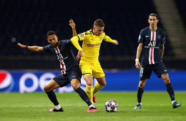 Borussia Dortmund s Thorgan Hazard in action with Paris St Germain s Angel Di Maria and Thilo Kehrer FOOTBALL : Paris St Germain v Borussia Dortmund - Ligue des Champions - Paris - 11 03 2020 Panoramic Panoramic 