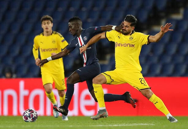 Paris St Germain s Idrissa Gueye in action with Borussia Dortmund s Emre Can FOOTBALL : Paris St Germain v Borussia Dortmund - Ligue des Champions - Paris - 11 03 2020 Panoramic Panoramic 