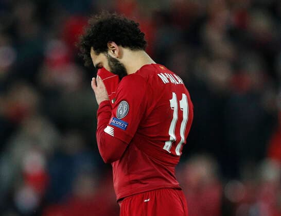 Dejected Mohamed Salah of Liverpool during the UEFA Champions League match at Anfield, Liverpool. Picture date: 11th March 2020. Picture credit should read: Darren Staples Sportimage EDITORIAL USE ONLY. No use with unauthorised audio, video, data, fixture lists, club league logos or live services. Online in-match use limited to 120 images, no video emulation. No use in betting, games or single club league player publications. SPI-0539-0115