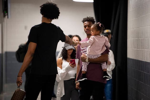 March 11, 2020, Sacramento, CA, USA: Sacramento Kings forward Marvin Bagley III (35) fist bumps Sacramento Kings guard Buddy Hield (24) and his child as they leave the Golden 1 Center on Wednesday, March 11, 2020 in Sacramento after the NBA, Basketball Herren, USA suspends season after JazzÃ¢â‚¬â ¢s Rudy Gobert tests positive for coronavirus. Sacramento USA - ZUMAj89_ 20200311_zaf_j89_023 Copyright: xPaulxKitagakixJr.x