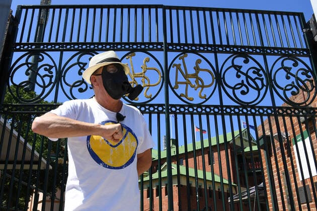 CRICKET ODI GAME 1 AUSTRALIA NZ, A spectator who goes by the name of Craig Polystyrene wears a gas mask outside the locked gates of the SCG ahead of the ODI between Australia and New Zealand which has been closed to spectators in Sydney, Friday, March 13, 2020. Cricket Australia decided to close all matches in the ODI series against New Zealand to spectators due to the COVID-19 Coronavirus. ( NO ARCHIVING, EDITORIAL USE ONLY, NO USE IN BOOKS WITHOUT CONSENT SYDNEY NSW AUSTRALIA  Copyright: xDEANxLEWINSx 20200313001456395449