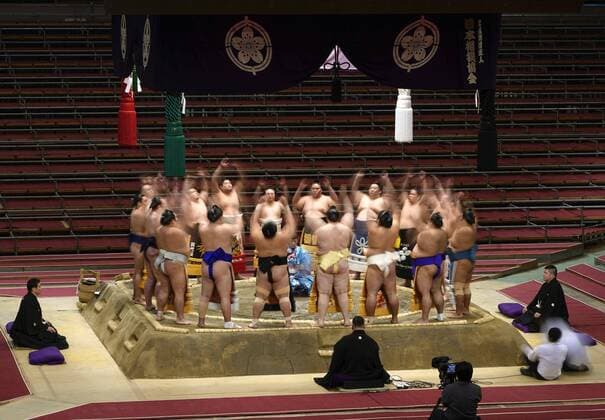 Sumo: Spring tournament without fans Sumo wrestlers perform a ring-entering ceremony during the Spring Grand Sumo Tournament at an empty Edion Arena Osaka on March 12, 2020. The tournament has been held behind closed doors due to the coronavirus outbreak. 