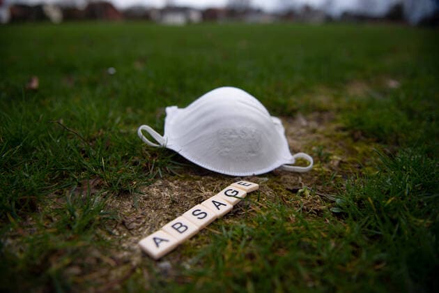 Germany 13 03 2020 Symbolic images Coronavirus The coronavirus causes cancellation of Bundesliga football matches, concerts or schools to be closed Here A face mask in a goal net on a football pitch with the word cancellation Germany