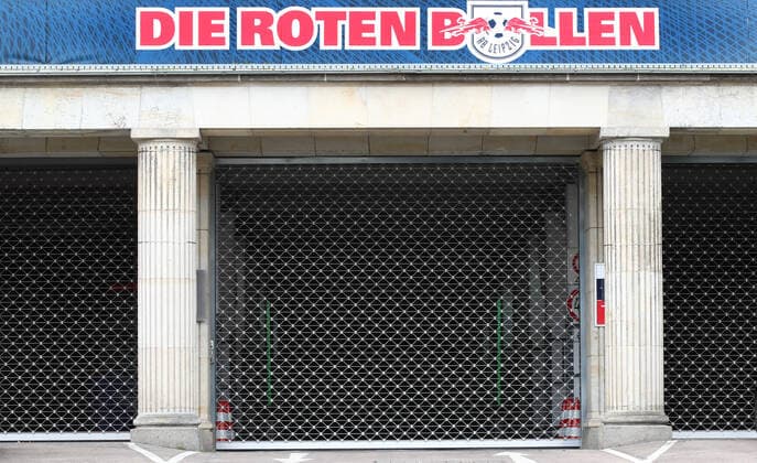 Red Bull Arena Leipzig, 21 03 2020, View of the Red Bull Arena, home of the Bundesliga football club RasenBallsport Leipzig RB Leipzig , In the picture the lettering DIE ROTEN BULLEN over the closed gate of the stadium entrance,