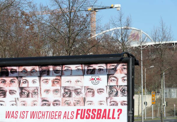 RBL Wir alle Leipzig, 26 03 2020, RB Leipzig Solidarity in the Corona Crisis What is more important than football We all The health of all goes before the campaign of football Bundesliga club RasenBallsport Leipzig , In the picture Wiralle poster In the background the Red Bull Arena ,