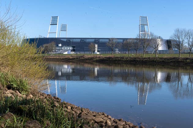 GER, 1 FBL, Werder Bremen The ball rests at the stadiumm 31 03 2020, wohninvest WESERSTADION,, Bremen, GER, 1 FBL, Werder Bremen The ball rests at the stadiumm, in the picture That can Weser stadium shines in the sun over the water there is reflected the floodlights and the stadium nordphotoxKokenge nph00001
