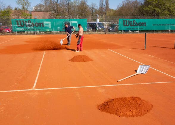 Tennis courts will be prepared for the new season, Munich, Bavaria, Germany Copyright: xJuergenxHasenkopfx