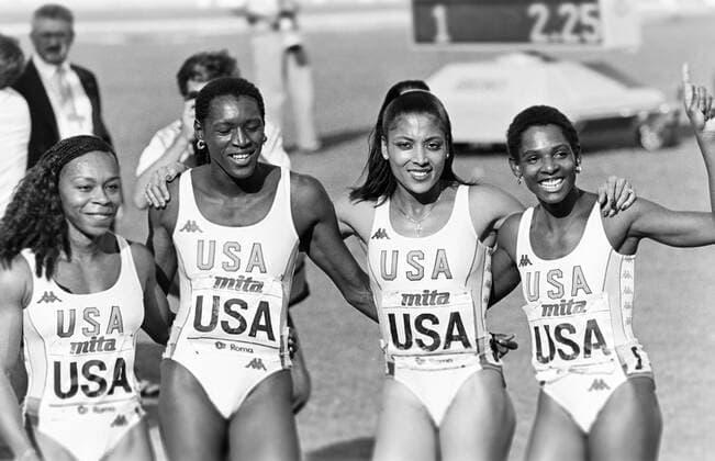 870906 Athletics, World Athletics Championships: Alice Brown, Pam Marshall, Florence Griffith-Joyner and Diane Williams of USA celebrates after winning the womens 4x100 m relay at The World Athletics Championships on September 6, 1987 in Rome, Italy. BILDBYRAN *** 870906 Athletics, World Athletics Championships Alice Brown, Pam Marshall, Florence Griffith Joyner and Diane Williams of USA celebrates after winning the womens 4x100 m relay at The World Athletics Championships on September 6, 1987 in Rome, Italy BILDBYRAN,  Copyright: BILDBYRAN 870906007