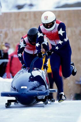 Bobsled Two man bobsled team pushing off at the start Lake placid New York USA,model released, Symbolfoto Copyright: xPaulxJxSutton DUOMO PCNx BD0272 106004