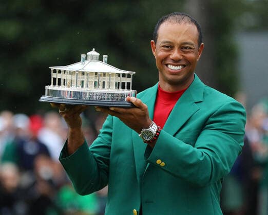 April 10, 2020, USA: Wearing his new green jacket, Tiger Woods holds the trophy for winning The Masters at Augusta National Golf Club. USA - ZUMAm67_ 20200410_zaf_m67_022 Copyright: xCurtisxComptonx