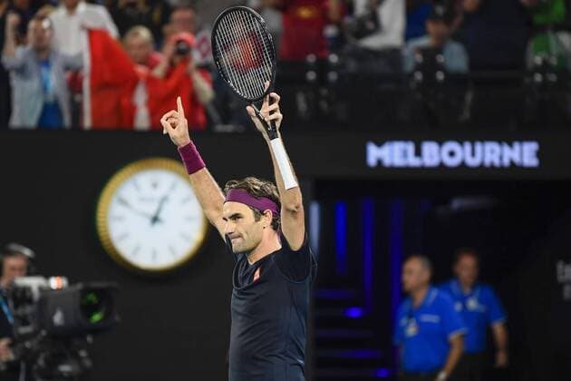 Tennis: Roger Federer Photo taken in the small hours of Jan. 25, 2020, shows Roger Federer of Switzerland celebrating after beating John Millman of Australia in the third round of the Australian Open tennis tournament in Melbourne. 