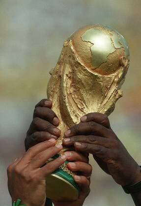 Inpho Photo Packages - Imagery Of Hands Through The Years 17 4 2020 1994 World Cup Final, Rose Bowl, Pasadena, California, USA Brazil vs Italy Brazilian hands on the FIFA World Cup, WM, Weltmeisterschaft, Fussball Trophy after beating Italy on penalties Brazilian hands on the FIFA World Cup Trophy 17 4 2020  Copyright: x INPHO BillyxSticklandx inpho_00008776