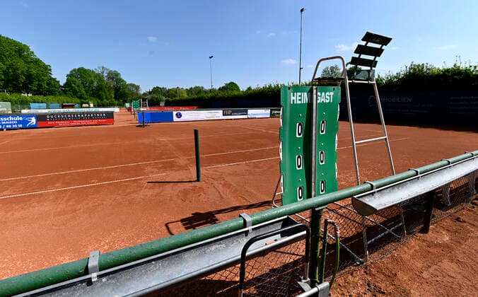 CORONA PANDEMIE,CORONAVIRUS,COVID 19 amateur tennis courts,the game and training operation is suspended Orphaned,empty amateur tennis ash courts hard court ,photographed on 25 04 2020 in Mülheim Ruhr,town in the Ruhr area in the state of North Rhine-Westphalia NRW Â