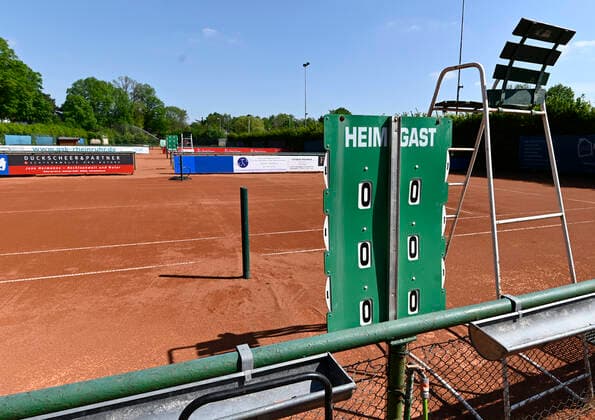 CORONA PANDEMIE,CORONAVIRUS,COVID 19 amateur tennis courts,the game and training operation is suspended Orphaned,empty amateur tennis ash courts hard court ,photographed on 25 04 2020 in Mülheim Ruhr,town in the Ruhr area in the state of North Rhine-Westphalia NRW Â