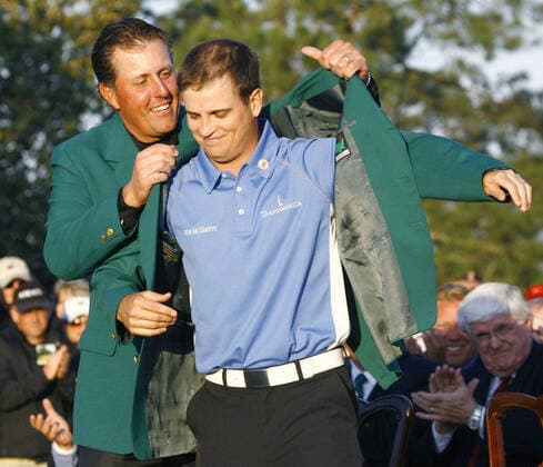 Golf: Zach Johnson, Phil Mickelson Zach Johnson receives the Masters green jacket from U.S. compatriot Phil Mickelson after winning the tournament in Augusta, Georgia, on April 8, 2007. 