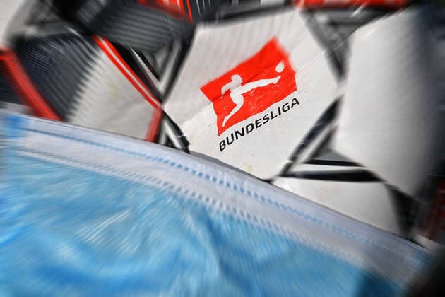 DFL reports a total of ten positive corona tests in the 1 and 2 Bundesliga Archive photo Theme photo Feature Consequences of the corona pandemic on professional sports and the football leagues It is completely open how the game will continue when and if it will be possible to play again at all Now the DFL is planning to continue the game from 9 May 2020 Logo of the Bundesliga on the official match ball Derbystar The ball is wearing a protective mask, mouth guard, mouth mask Football 1 Bundesliga Â