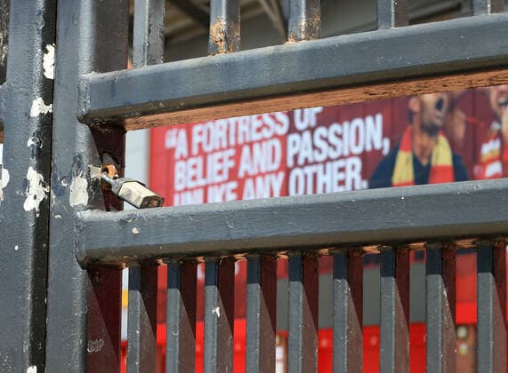 Anfield stadium during the suspension of the Premier League Anfield, Liverpool, Merseyside, England; Anfield, Liverpool, Merseyside, England; padlocked gates outside the entrance to the Kop  ActionPlus12218563 DavidxBlunsden
