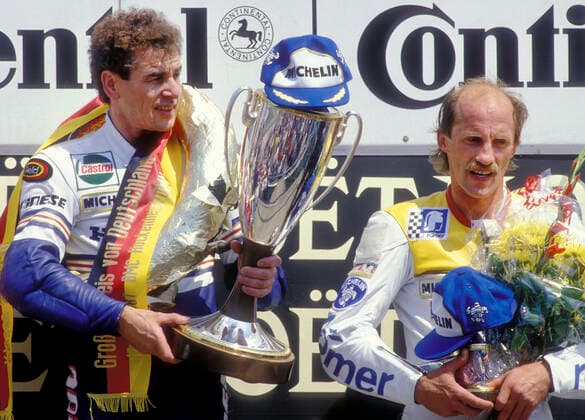 Motorcycle World Championship class 250 ccm , Grand Prix of Germany on 17 05 1987 at the Hockenheimring Winner Anton Toni MANG GER left and 3 Reinhold ROTH GER right at the award ceremony
