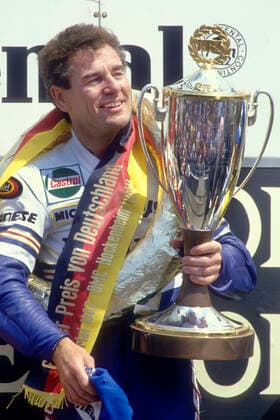Motorcycle World Championship class 250 ccm , Grand Prix of Germany on 17 05 1987 at the Hockenheimring Winner Anton Toni MANG GER left and 3 Reinhold ROTH GER right at the award ceremony
