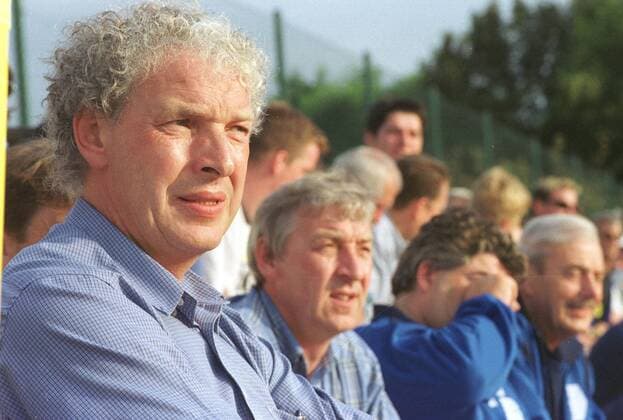 Klaus Toppmoeller Coach of 1 FC Saarbruecken sits on Monday 7 August 2000 in Ommersheim Saarland on the sidelines ud watching his team The second division team played a friendly against TUS Ommersheim much to the delight of fans and players The 1 FCS won 12 1