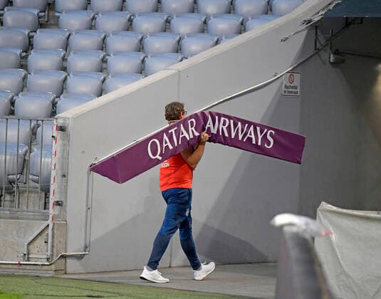 13 06 2020, FC Bayern Muenchen Borussia Moenchengladbach 13 06 2020, Football 1 Bundesliga 2019 2020, 32 matchday, FC Bayern Muenchen Borussia Moenchengladbach, in the Allianz Arena Munich, helpers carry the sponsors advertising displays from the stadium, Qatar Airways Photo Bernd Feil M i S Pool Only for journalistic purposes Only for editorial use In accordance with the regulations of the DFL Deutsche Fußball Liga, it is prohibited to use or have used photographs taken in the stadium and or of the match in the form of sequence images and or video-like photo sequences DFL regulations prohibit any use of photographs as image sequences and or quasi video National and international NewsAgencies OUT Munich Bavaria Germany Poolfoto ,EDITORIAL USE ONLY