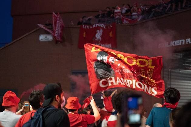 Football - 2019 2020 Premier League - Chelsea vs Manchester City Liverpool fans take the streets in expectation of a first-ever Premier League title - and first English title for 30 years - with Manchester City needing victory against Chelsea at Stamford Bridge to deny them. COLORSPORT TERRY DONNELLY 