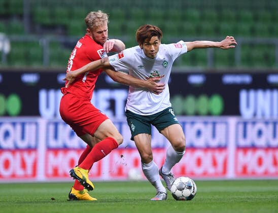 Werder Bremen 1 FC Heidenheim Football, Relegation, Werder Bremen 1 FC Heidenheim Duel Yuya Osako Bremen v Sebastian Griesbeck Heidenheim Photo Marvin Ibo Güngör GES Pool via xim gs DFL regulations prohibit any use of photographs as image sequences and or quasi video Editorial use only National and international news agencies out Bremen Germany Poolfoto Marvin Ibo Güngör GES Pool via xim.gs ,EDITORIAL USE ONLY