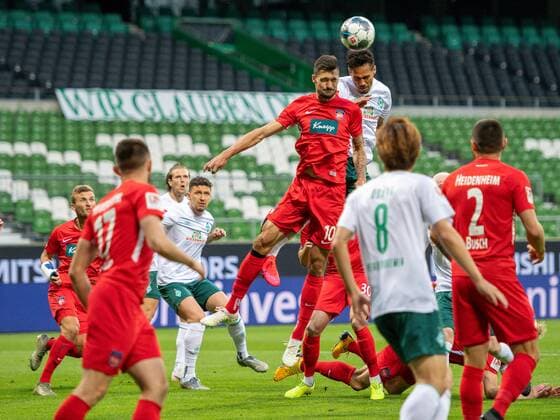 GER, Werder Bremen vs FC Heidenheim, Football, Bundesliga Religation, 2019 2020, 02 07 2020 Tim Kleindienst FC Heidenheim, 10 , Theodor Gebre Selassie SV Werder Bremen 23 , GER, Werder Bremen vs FC Heidenheim, Football, Bundesliga Religation, 2019 2020, 02 07 2020, DFB DFL regulations prohibit any use of photographs as image sequences and or quasi video , Foto EIBNER Sascha Walther Bremen Weser Stadion Hansestadt Bremen Deutschland Poolfoto Eibner Walther Pool ,EDITORIAL USE ONLY