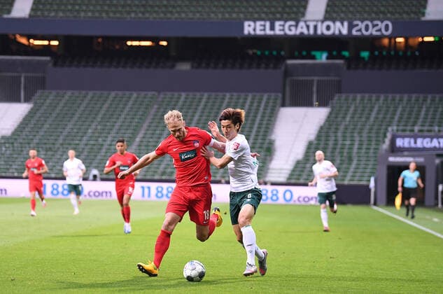 Werder Bremen 1 FC Heidenheim Football, Relegation, Werder Bremen 1 FC Heidenheim Duel Kevin Moehwald Bremen v Sebastian Griesbeck Heidenheim Photo Marvin Ibo Güngör GES Pool via xim gs DFL regulations prohibit any use of photographs as image sequences and or quasi video Editorial use only National and international news agencies out Bremen Germany Poolfoto Marvin Ibo Güngör GES Pool via xim.gs ,EDITORIAL USE ONLY
