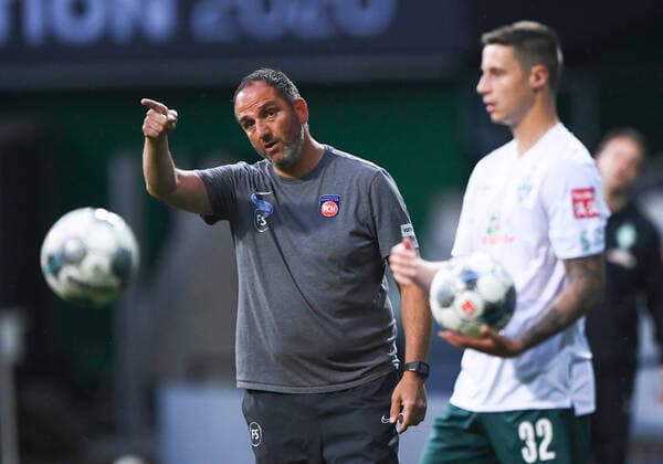 Werder Bremen 1 FC Heidenheim Football, Relegation, Werder Bremen 1 FC Heidenheim Coach Frank Schmidt Heidenheim gesticulates Right Marco Friedl Bremen Photo Marvin Ibo Güngör GES Pool via xim gs DFL regulations prohibit any use of photographs as image sequences and or quasi video Editorial use only National and international news agencies out Bremen Germany Poolfoto Marvin Ibo Güngör GES Pool via xim.gs ,EDITORIAL USE ONLY
