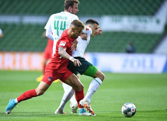 Werder Bremen 1 FC Heidenheim Football, Relegation, Werder Bremen 1 FC Heidenheim v l Philipp Bargfrede, Niklas Dorsch Heidenheim , Maximilian Eggestein Photo Tim Groothuis Witters Pool via xim gs DFL regulations prohibit any use of photographs as image sequences and or quasi video Editorial use only National and international news agencies out Bremen Germany Poolfoto Tim Groothuis Witters Pool via xim.gs ,EDITORIAL USE ONLY