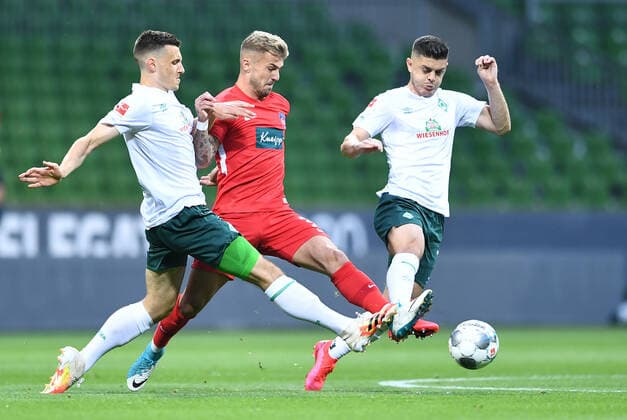 Werder Bremen 1 FC Heidenheim Football, Relegation, Werder Bremen 1 FC Heidenheim v l Maximilian Eggestein Bremen , Niklas Dorsch, Milot Rashica Photo Tim Groothuis Witters Pool via xim gs DFL regulations prohibit any use of photographs as image sequences and or quasi video Editorial use only National and international news agencies out Bremen Germany Poolfoto Tim Groothuis Witters Pool via xim.gs ,EDITORIAL USE ONLY