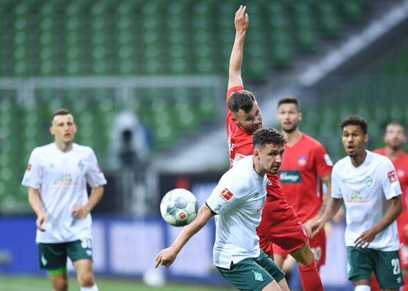 Werder Bremen 1 FC Heidenheim Football, Relegation, Werder Bremen 1 FC Heidenheim v l Denis Thomalla, Milos Veljkovic Bremen Photo Tim Groothuis Witters Pool via xim gs DFL regulations prohibit any use of photographs as image sequences and or quasi video Editorial use only National and international news agencies out Bremen Germany Poolfoto Tim Groothuis Witters Pool via xim.gs ,EDITORIAL USE ONLY