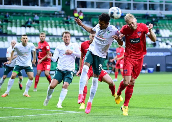 Werder Bremen 1 FC Heidenheim Football, Relegation, Werder Bremen 1 FC Heidenheim v l Theodor Gebre Selassie Bremen , Sebastian Griesbeck Photo Tim Groothuis Witters Pool via xim gs DFL regulations prohibit any use of photographs as image sequences and or quasi video Editorial use only National and international news agencies out Bremen Germany Poolfoto Tim Groothuis Witters Pool via xim.gs ,EDITORIAL USE ONLY