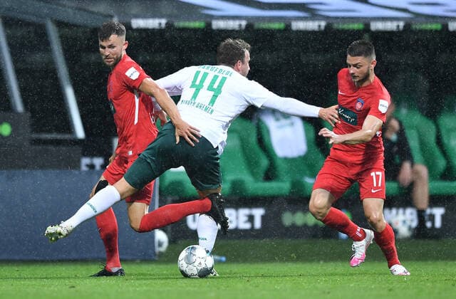 Werder Bremen 1 FC Heidenheim Football, Relegation, Werder Bremen 1 FC Heidenheim v l Denis Thomalla, Philipp Bargfrede Bremen , Maurice Multhaup Photo Tim Groothuis Witters Pool via xim gs DFL regulations prohibit any use of photographs as image sequences and or quasi video Editorial use only National and international news agencies out Bremen Germany Poolfoto Tim Groothuis Witters Pool via xim.gs ,EDITORIAL USE ONLY