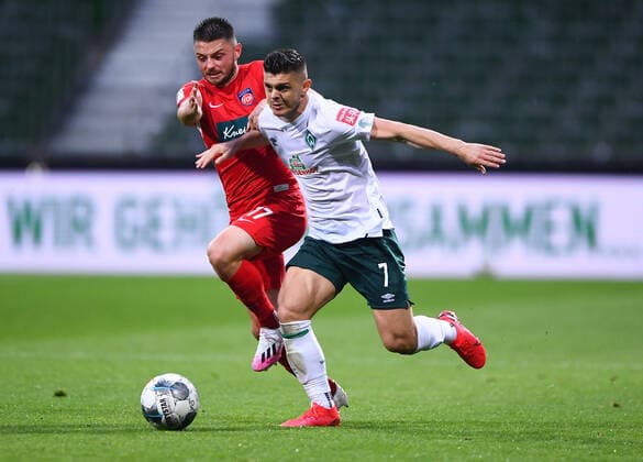 Werder Bremen 1 FC Heidenheim Football, Relegation, Werder Bremen 1 FC Heidenheim Duel Milot Rashica Bremen v Maurice Multhaup Heidenheim Photo Marvin Ibo Güngör GES Pool via xim gs DFL regulations prohibit any use of photographs as image sequences and or quasi video Editorial use only National and international news agencies out Bremen Germany Poolfoto Marvin Ibo Güngör GES Pool via xim.gs ,EDITORIAL USE ONLY
