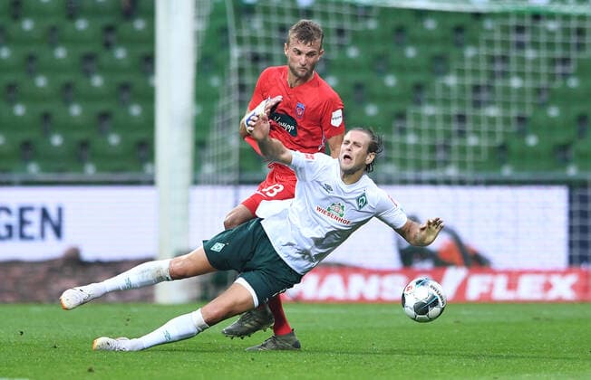 Werder Bremen 1 FC Heidenheim Football, Relegation, Werder Bremen 1 FC Heidenheim v l Timo Beermann, Niclas Fuellkrug Bremen Photo Tim Groothuis Witters Pool via xim gs DFL regulations prohibit any use of photographs as image sequences and or quasi video Editorial use only National and international news agencies out Bremen Germany Poolfoto Tim Groothuis Witters Pool via xim.gs ,EDITORIAL USE ONLY