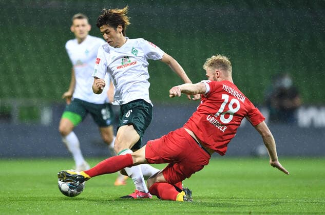 Werder Bremen 1 FC Heidenheim Football, Relegation, Werder Bremen 1 FC Heidenheim v l Yuya Osako Bremen , Sebastian Griesbeck Photo Tim Groothuis Witters Pool via xim gs DFL regulations prohibit any use of photographs as image sequences and or quasi video Editorial use only National and international news agencies out Bremen Germany Poolfoto Tim Groothuis Witters Pool via xim.gs ,EDITORIAL USE ONLY