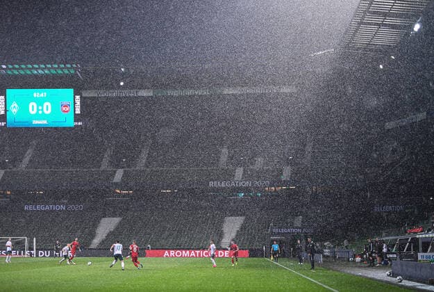 Werder Bremen 1 FC Heidenheim football, relegation, Werder Bremen 1 FC Heidenheim rain, thunderstorms, weather at Weser Stadium, floodlight Photo Marvin Ibo Güngör GES Pool via xim gs DFL regulations prohibit any use of photographs as image sequences and or quasi video Editorial use only National and international news agencies out Bremen Germany Poolfoto Marvin Ibo Güngör GES Pool via xim.gs ,EDITORIAL USE ONLY