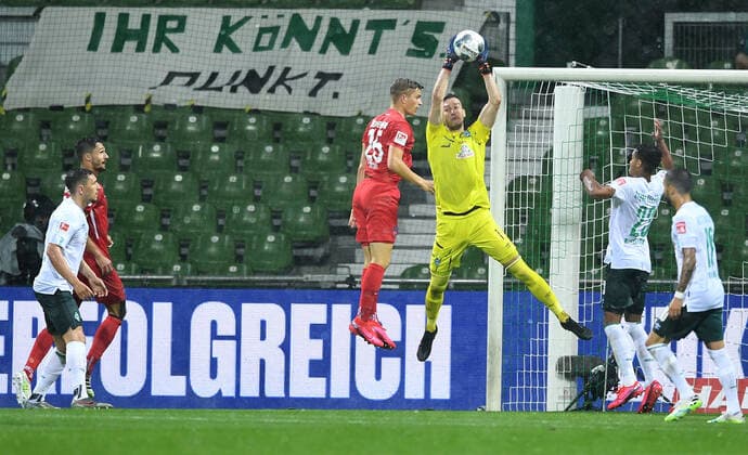 Werder Bremen 1 FC Heidenheim Football, Relegation, Werder Bremen 1 FC Heidenheim v l David Otto Heidenheim , Goalkeeper Jiri Pavlenka Bremen , Theodor Gebre Selassie Photo Tim Groothuis Witters Pool via xim gs DFL regulations prohibit any use of photographs as image sequences and or quasi video Editorial use only National and international news agencies out Bremen Germany Poolfoto Tim Groothuis Witters Pool via xim.gs ,EDITORIAL USE ONLY