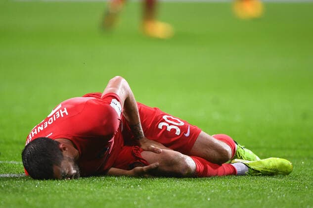 Werder Bremen 1 FC Heidenheim Football, Relegation, Werder Bremen 1 FC Heidenheim Injured on the ground Norman Theuerkauf Heidenheim with pain Photo Marvin Ibo Güngör GES Pool via xim gs DFL regulations prohibit any use of photographs as image sequences and or quasi video Editorial use only National and international news agencies out Bremen Germany Poolfoto Marvin Ibo Güngör GES Pool via xim.gs ,EDITORIAL USE ONLY