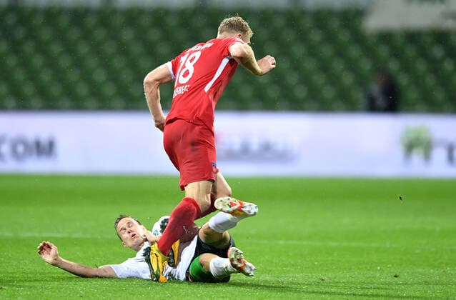 Werder Bremen 1 FC Heidenheim Football, Relegation, Werder Bremen 1 FC Heidenheim Foul to red card by Niklas Moisander Bremen , Sebastian Griesbeck Photo Tim Groothuis Witters Pool via xim gs DFL regulations prohibit any use of photographs as image sequences and or quasi video Editorial use only National and international news agencies out Bremen Germany Poolfoto Tim Groothuis Witters Pool via xim.gs ,EDITORIAL USE ONLY