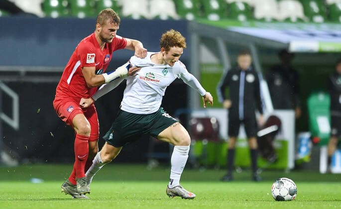 Werder Bremen 1 FC Heidenheim Football, Relegation, Werder Bremen 1 FC Heidenheim v l Timo Beermann, Joshua Sargent Bremen Photo Tim Groothuis Witters Pool via xim gs DFL regulations prohibit any use of photographs as image sequences and or quasi video Editorial use only National and international news agencies out Bremen Germany Poolfoto Tim Groothuis Witters Pool via xim.gs ,EDITORIAL USE ONLY
