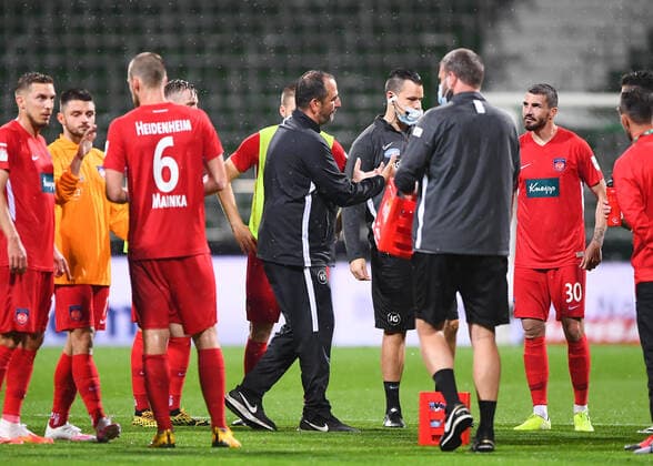 Werder Bremen 1 FC Heidenheim Football, Relegation, Werder Bremen 1 FC Heidenheim After the game, coach Frank Schmidt Heidenheim speaks to the team Photo Marvin Ibo Güngör GES Pool via xim gs DFL regulations prohibit any use of photographs as image sequences and or quasi video Editorial use only National and international news agencies out Bremen Germany Poolfoto Marvin Ibo Güngör GES Pool via xim.gs ,EDITORIAL USE ONLY