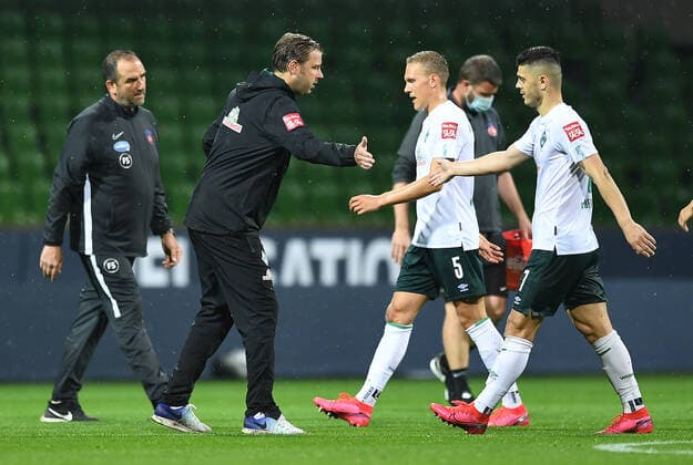Werder Bremen 1 FC Heidenheim Football, Relegation, Werder Bremen 1 FC Heidenheim v l Trainer Frank Schmidt Heidenheim , Trainer Florian Kohfeldt Bremen , Ludwig Augustinsson, Milot Rashica Photo Tim Groothuis Witters Pool via xim gs DFL regulations prohibit any use of photographs as image sequences and or quasi video Editorial use only National and international news agencies out Bremen Germany Poolfoto Tim Groothuis Witters Pool via xim.gs ,EDITORIAL USE ONLY