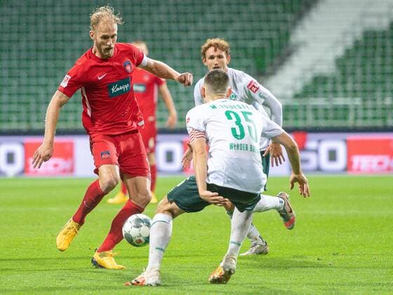 GER, Werder Bremen vs FC Heidenheim, Football, Bundesliga Religation, 2019 2020, 02 07 2020 Sebastian Griesbeck FC Heidenheim, 18 , Maximilian Eggestein SV Werder Bremen 35 , GER, Werder Bremen vs FC Heidenheim, Football, Bundesliga Religation, 2019 2020, 02 07 2020, DFB DFL regulations prohibit any use of photographs as image sequences and or quasi video , Foto EIBNER Sascha Walther Bremen Weser Stadion Hanseatic City of Bremen Germany Poolfoto Eibner Walther Pool ,EDITORIAL USE ONLY